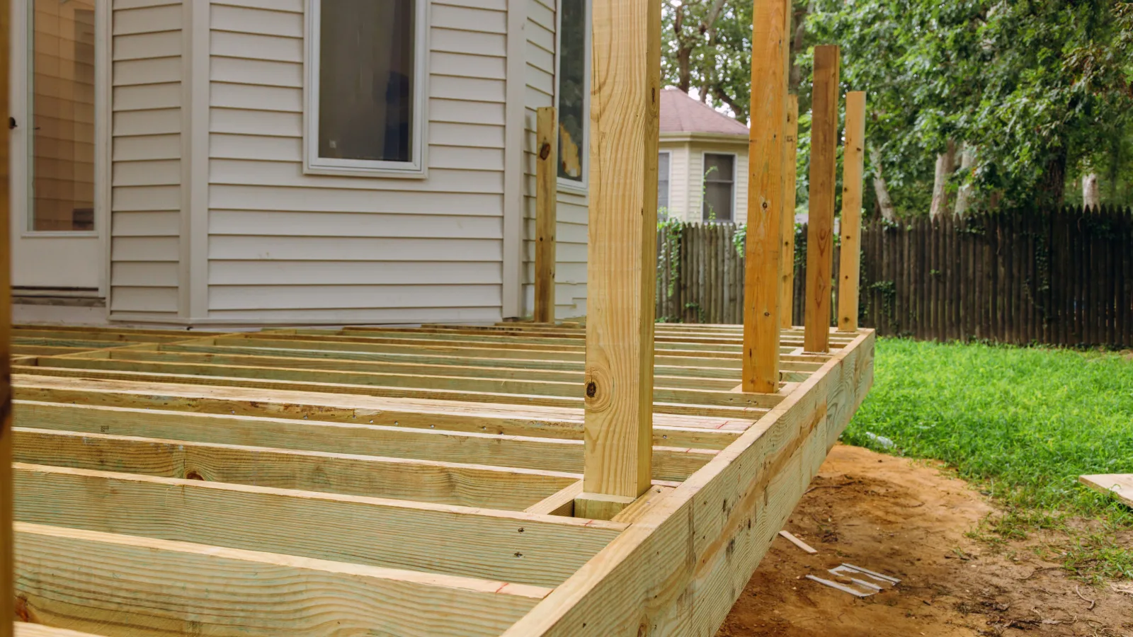 Deck framing under construction — stock photo for general reference, not an MCG project