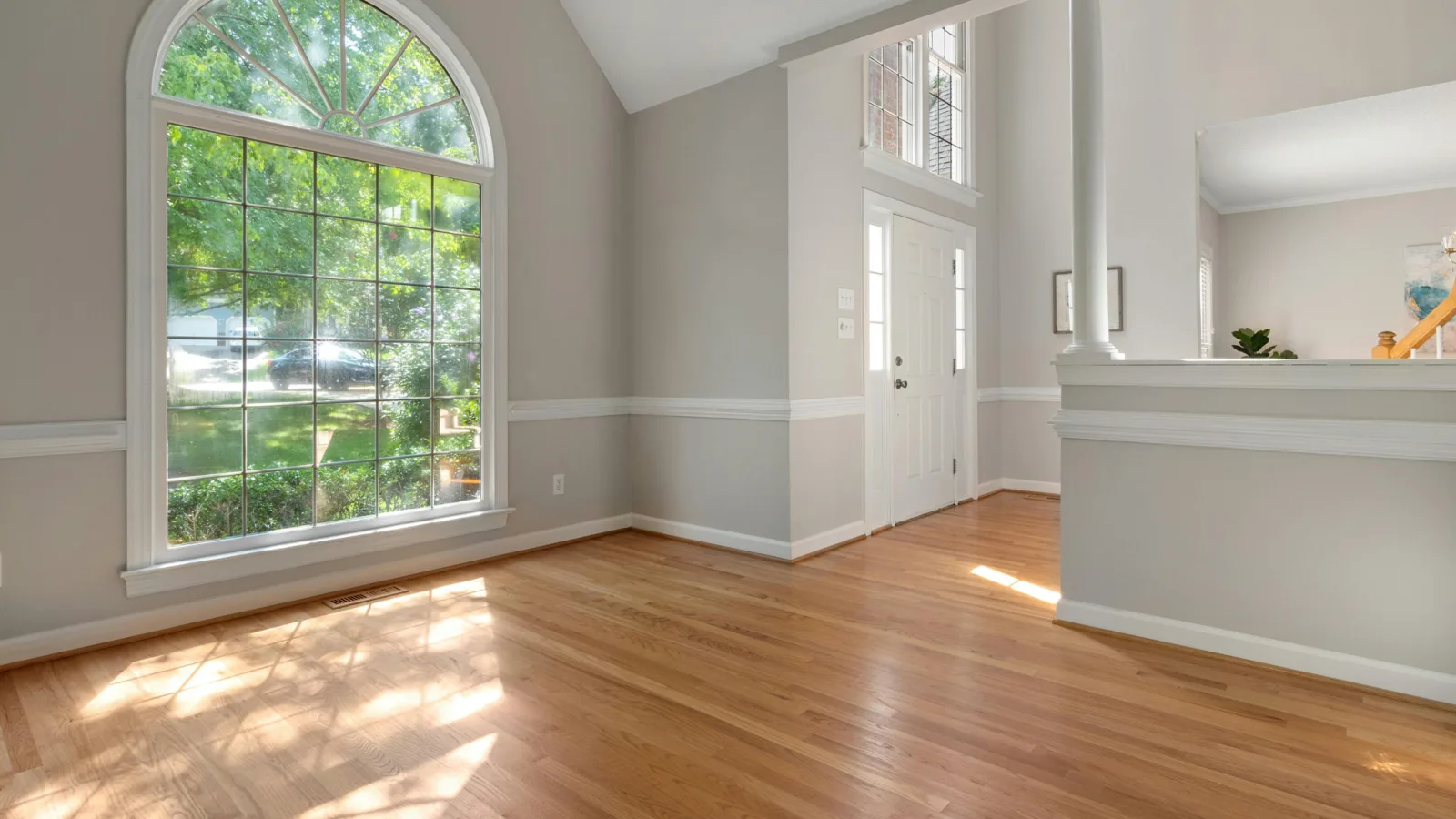 Renovated interior foyer with hardwood flooring — stock photo for general reference, not an MCG project