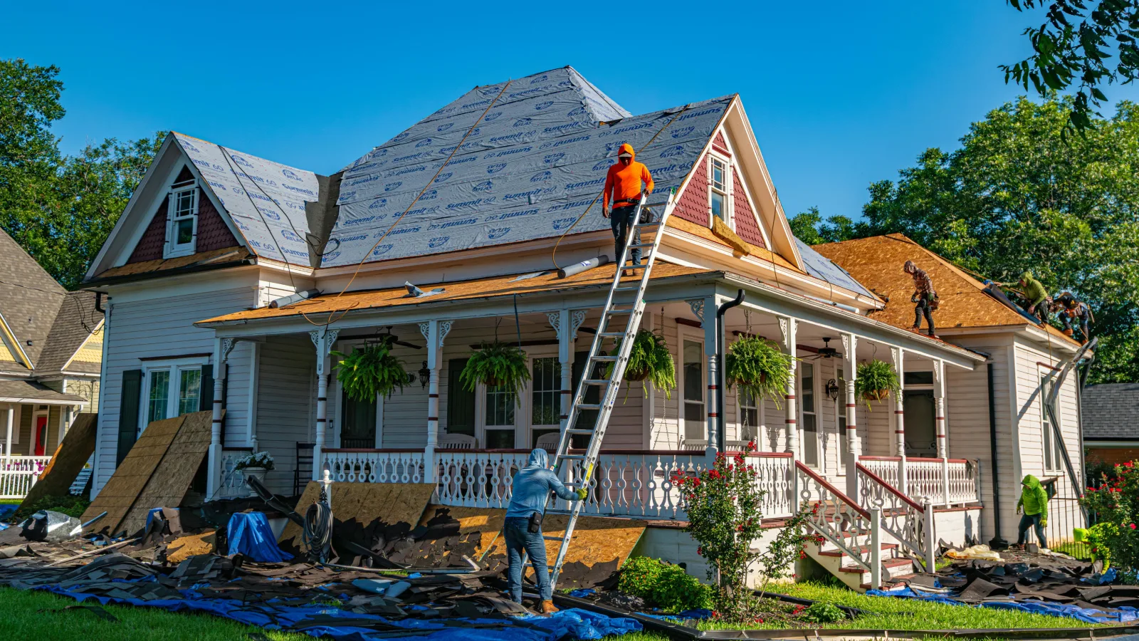 Roof re-shingling in progress — stock photo for general reference, not an MCG project