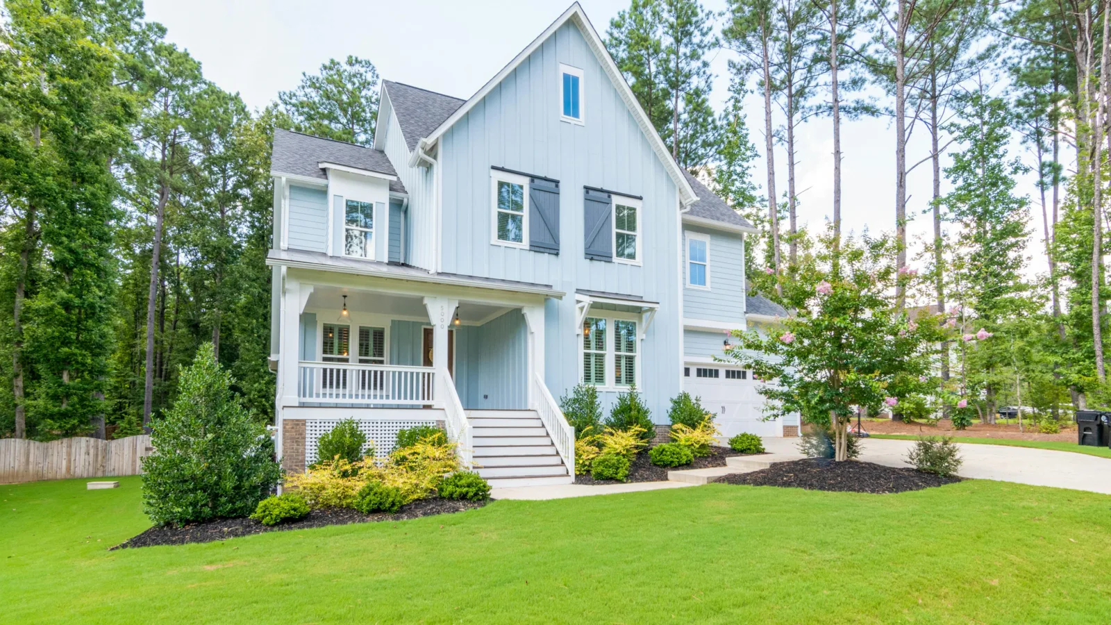Home exterior with board-and-batten siding — stock photo for general reference, not an MCG project